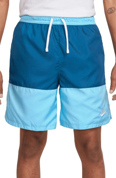 Shop Nike Essentials Colorblock Flow Shorts In Blue Chill/ Dark Blue/ White