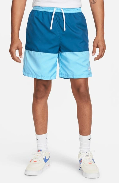 Shop Nike Essentials Colorblock Flow Shorts In Blue Chill/ Dark Blue/ White