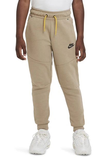 Shop Nike Tech Fleece Pants In Khaki/ Yellow Ochre/ Black