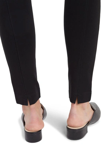 Shop Nydj High Waist Back Slit Pull-on Skinny Pants In Black