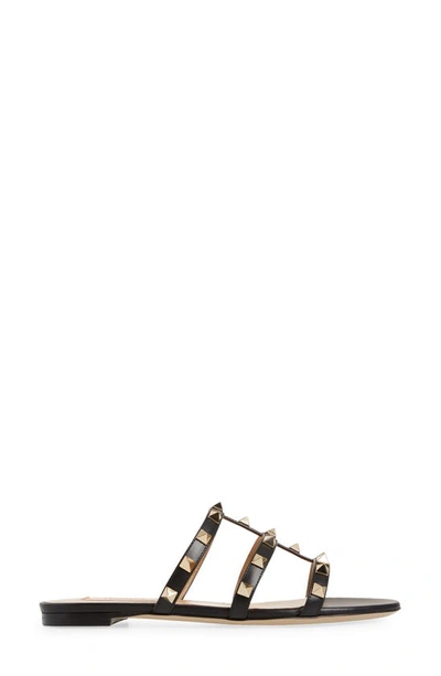 Shop Valentino Rockstud Slide Sandal In 0no Nero