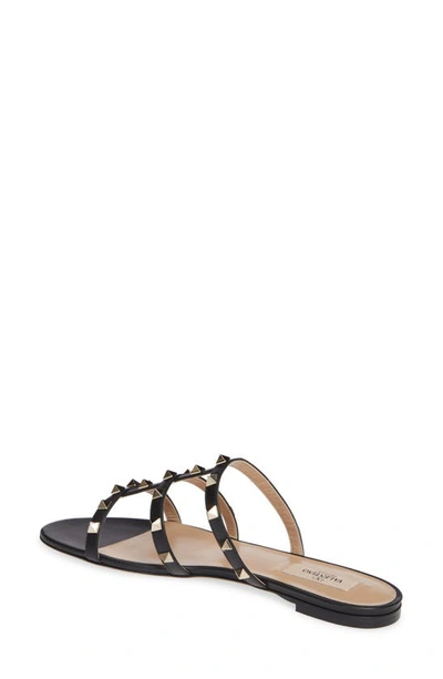 Shop Valentino Rockstud Slide Sandal In 0no Nero