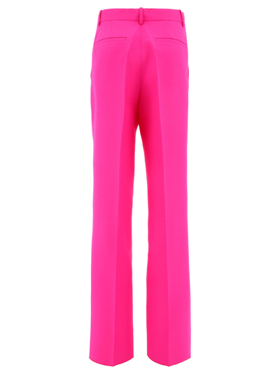 Shop Valentino "pink Pp" Trousers In Fuchsia