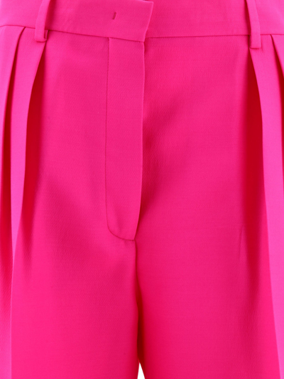 Shop Valentino "pink Pp" Trousers In Fuchsia