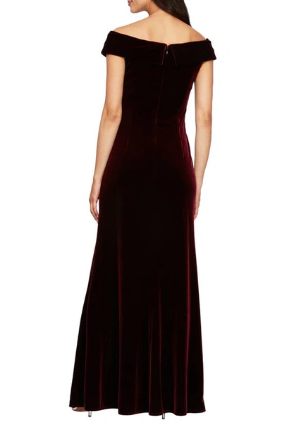 Shop Alex Evenings Off The Shoulder Velvet Fit & Flare Gown In Wine