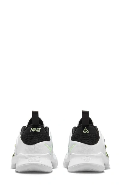 Shop Nike Kids' Giannis Freak 4 Sneaker In White/ Black/ Barely Volt