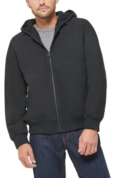 Shop Levi's Workwear Faux Shearling Lined Cotton Canvas Hooded Jacket In Black