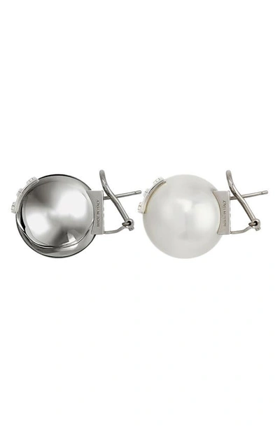 Shop Givenchy 4g Mismatched Stud Earrings In 132-white/ Silvery