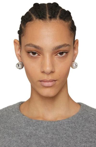 Shop Givenchy 4g Mismatched Stud Earrings In 132-white/ Silvery