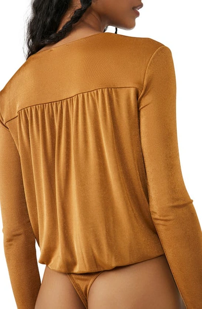 Shop Free People Turnt Bodysuit In Golden Nugget