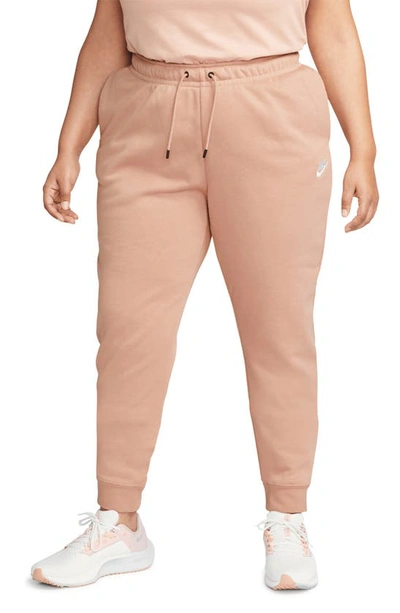 Shop Nike Sportswear Essential Fleece Pants In Rose Whisper/ White