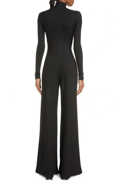 Shop Balenciaga Funnel Neck Long Sleeve Rib Jumpsuit In Black
