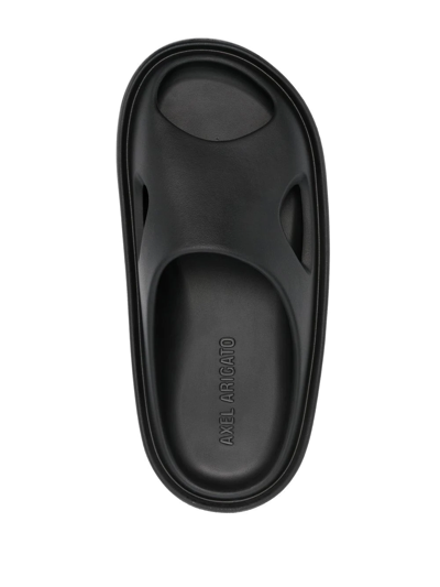 Shop Axel Arigato Cut-out Detail Slides In Schwarz