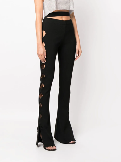 Shop Andreädamo Cut-out Flared Trousers In Schwarz