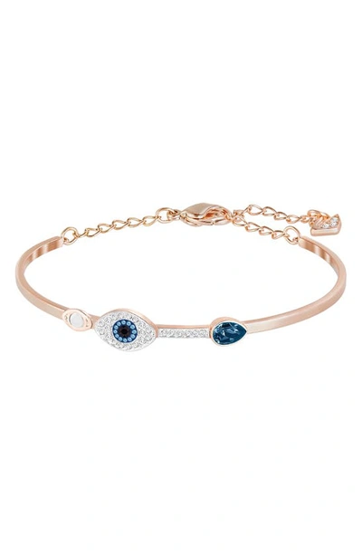 Swarovski Rose Gold-tone Clear And Blue Crystal Evil Eye Adjustable Bangle Bracelet In Rose Gold