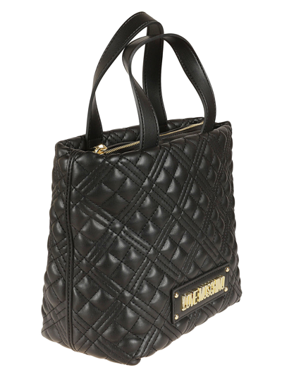 Shop Love Moschino Logo Plaque Quilted Tote In White
