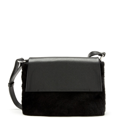 Shop La Canadienne Orman Leather And Shearling Messenger Bag In Black