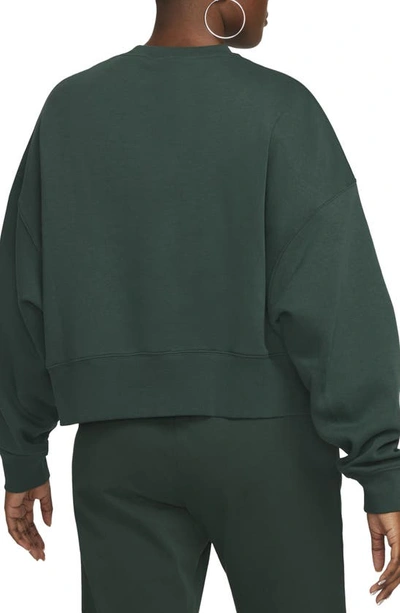 Shop Nike Sportswear Essential Oversize Sweatshirt In Pro Green/ White