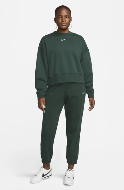 Shop Nike Sportswear Essential Oversize Sweatshirt In Pro Green/ White