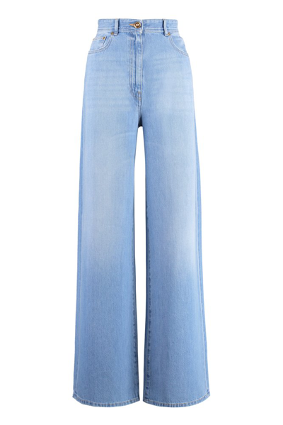 Shop Versace High Waist Logo Patch Jeans In Blue