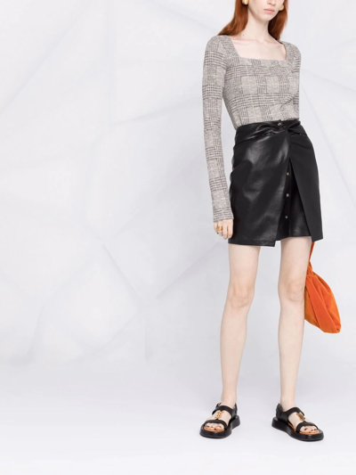 Shop Nanushka Meda Leather Mini Skirt In Black