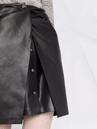Shop Nanushka Meda Leather Mini Skirt In Black