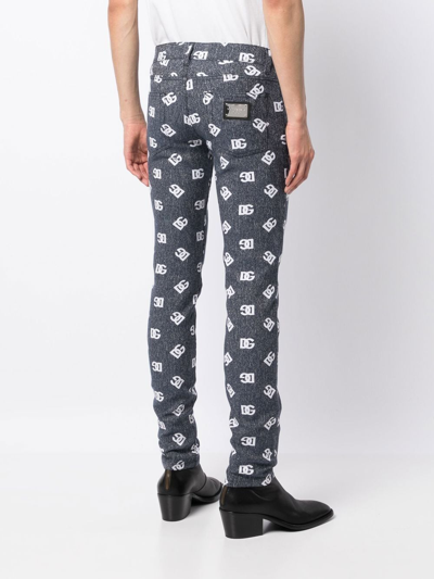 Dolce & Gabbana Slim-cut Monogram-print Jeans In Blau