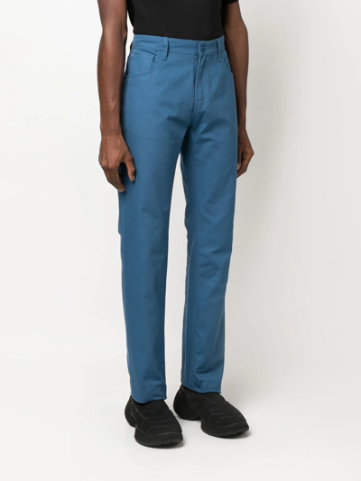 Shop Raf Simons Logo Plaque Straight-leg Trousers In Blau