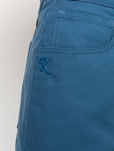 Shop Raf Simons Logo Plaque Straight-leg Trousers In Blau