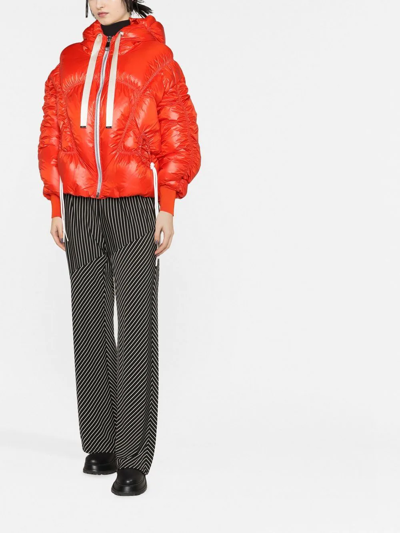 Shop Khrisjoy Iconic Puffer Jacket In Orange