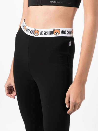 Shop Moschino Logo-waistband Detail Leggings In Schwarz