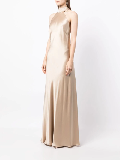 Shop Michelle Mason Backless Halter-neck Tie Gown In Gold