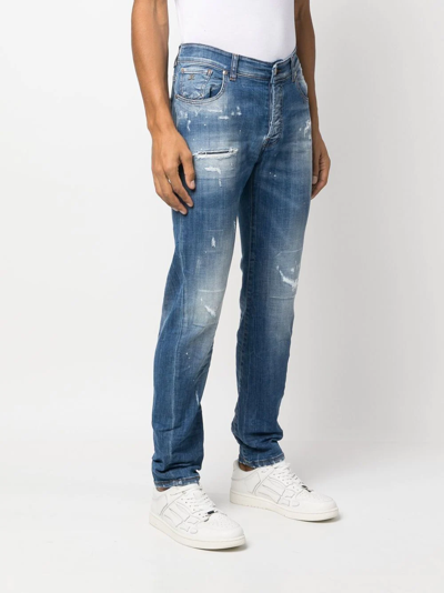 Shop John Richmond Distressed Slim-fit Jeans In Blau