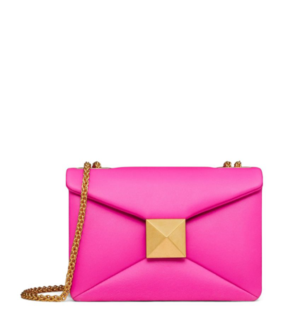 Shop Valentino Small Leather One Stud Cross-body Bag In Pink