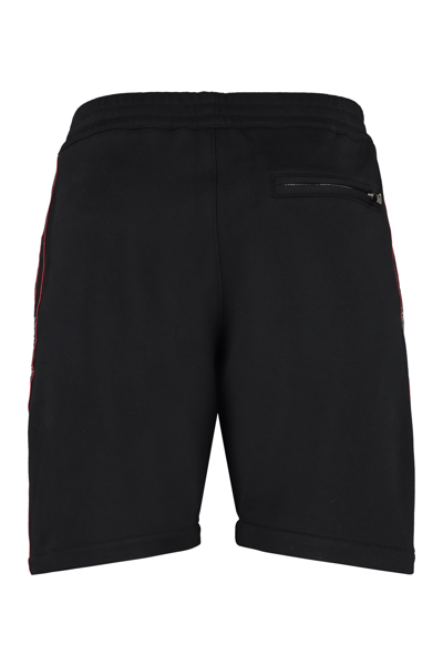 Shop Alexander Mcqueen Logoed Side Bands Shorts In Black