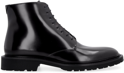 Shop Saint Laurent Leather Lace-up Boots In Black