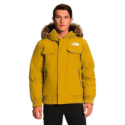 Shop The North Face Inc Men's Mcmurdo Bomber Jacket In Mineral Gold