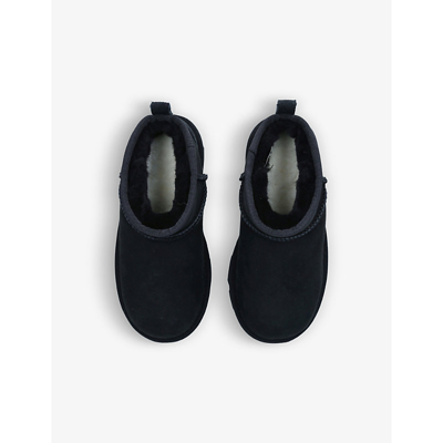 Shop Ugg Classic Ultra Mini Sheepskin Ankle Boots 7-10 Years In Black