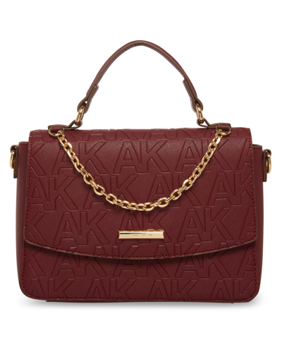 Shop Anne Klein Women's Embossed Top Handle Satchel Bag With Swag Chain In Red