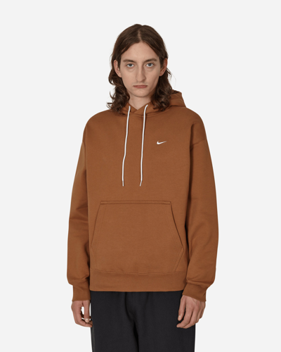 Shop Nike Solo Swoosh Hooded Sweatshirt Brown In Multicolor