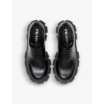 Shop Prada Monolith Brushed Leather Lace-up Shoes In Black