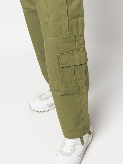 Shop Stussy Straight-leg Cut Cargo Trousers In Grün