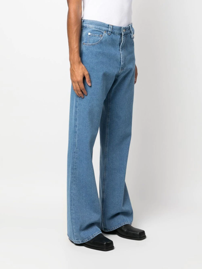 Shop Egonlab Flared-leg Denim Jeans In Blau