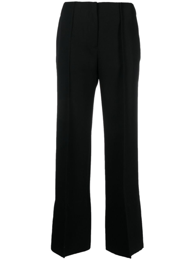 Shop Jil Sander Flared Wool Trousers In 黑色