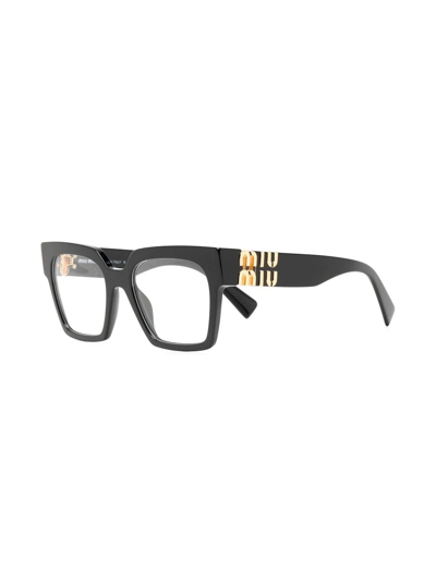 Shop Miu Miu Square Frame Glasses In Schwarz