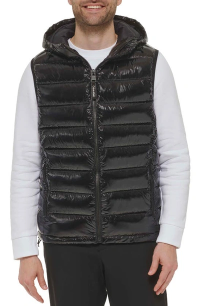 Shop Calvin Klein Hooded Puffer Vest In Shiny Black