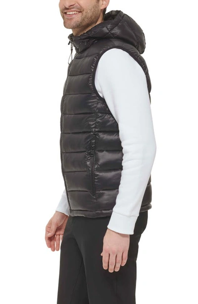 Shop Calvin Klein Hooded Puffer Vest In Black