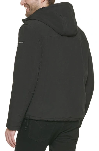 Calvin Klein Faux Shearling Lined Windbreaker Jacket In Black