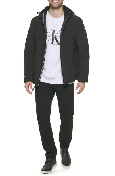 Calvin Klein Faux Shearling Lined Windbreaker Jacket In Black