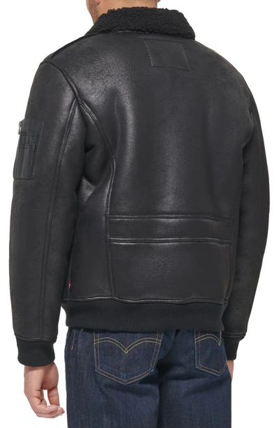 Shop Levi's Faux Shearling Collar Aviator Bomber Jacket In Black